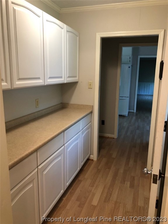 846 Bee Gee Road Lumberton, NC 28358 - Photo 17 of 42 a kitchen with white cabinets