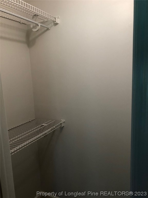 846 Bee Gee Road Lumberton, NC 28358 - Photo 37 of 42 a view of a room with racks on the wall