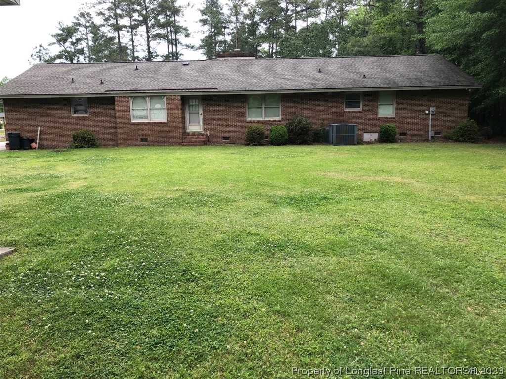 846 Bee Gee Road Lumberton, NC 28358 - Photo 7 of 42 a view of a yard in front of a house