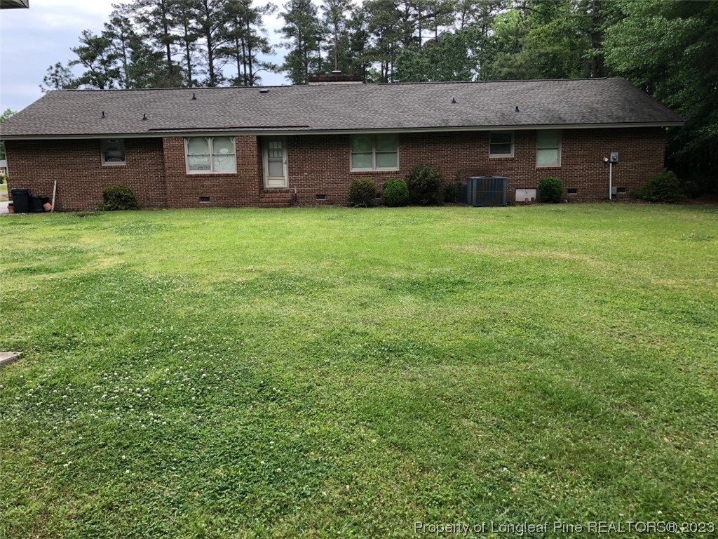 846 Bee Gee Road Lumberton, NC 28358 - Photo 8 of 42 a view of a yard in front of a house