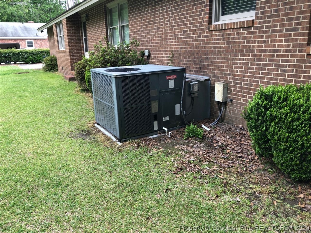 846 Bee Gee Road Lumberton, NC 28358 - Photo 9 of 42 a front view of a house with garden