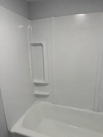 a bathroom with a bathtub