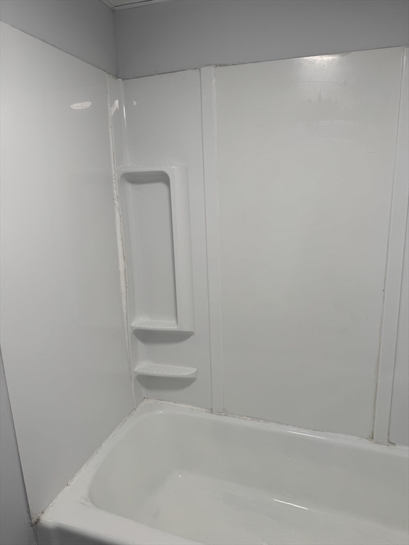 93 Webster Street, Unit 2 Fall River, MA 02723 - Photo 14 of 15 a bathroom with a bathtub