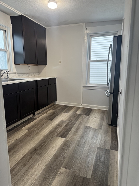 93 Webster Street, Unit 2 Fall River, MA 02723 - Photo 4 of 15 a bathroom with a sink and a mirror