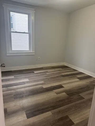 a view of a room with a window