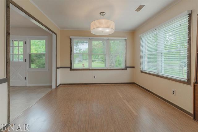14016 Dry Grove Road Bloomington, IL 61705 - Photo 14 of 43 a view of an empty room with a window