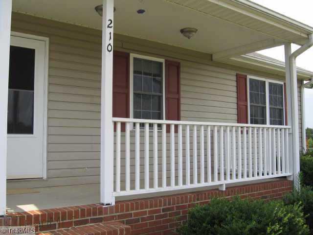 210 Lawrence Road Stokesdale, NC 27357 - Photo 8 of 9 Other. Front Porch
