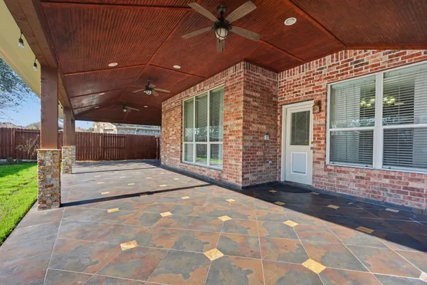 a view of entrance gate of a house with a street