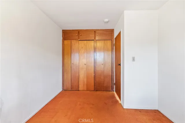 a view of a entryway with flower plants