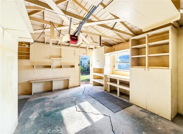 a view of car parked on the side of the road