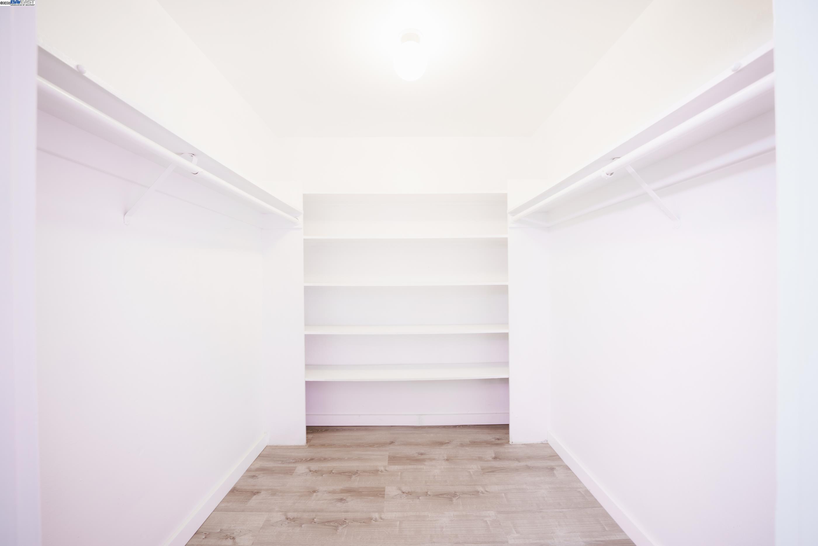 3815 Harrison Street, Unit 103 Oakland, CA 94611 - Photo 17 of 28 a view of a room with shelf