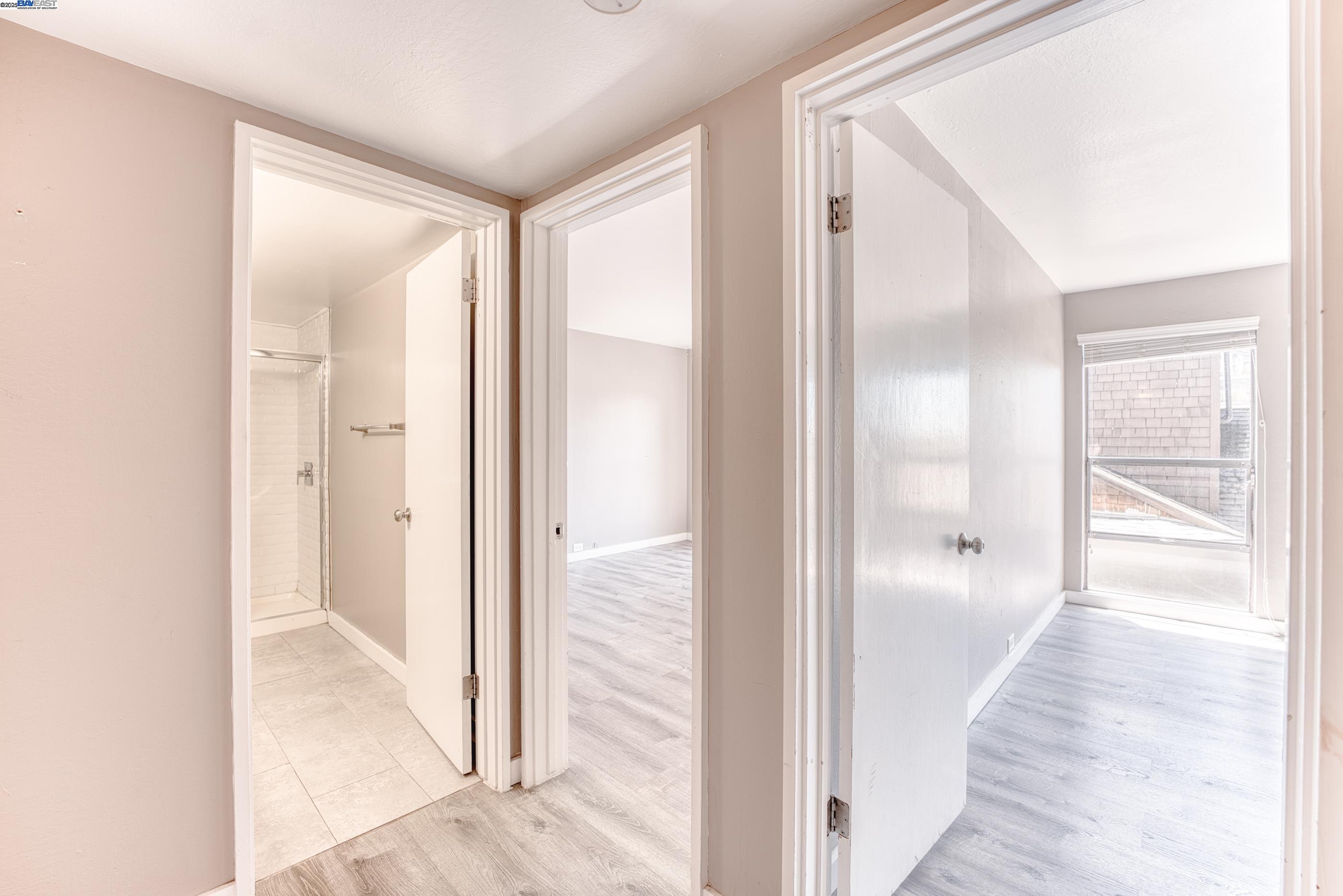 3815 Harrison Street, Unit 103 Oakland, CA 94611 - Photo 10 of 28 a view of a bathroom from a hallway