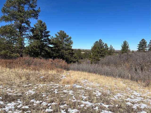 a view of lake with green space