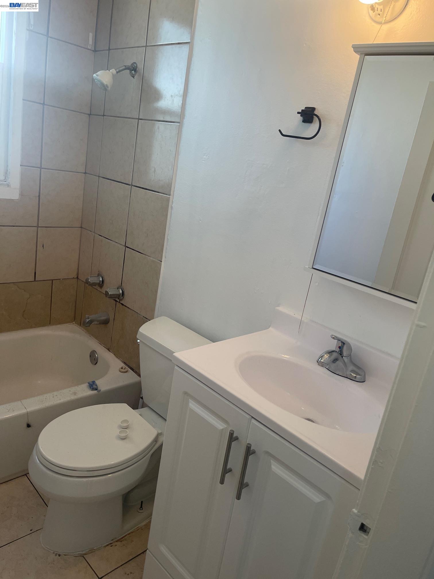 22622 2nd Street Hayward, CA 94541 - Photo 2 of 36 a bathroom with a sink a toilet and shower