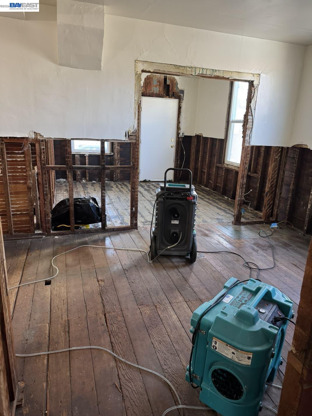 22622 2nd Street Hayward, CA 94541 - Photo 33 of 36 a living room with furniture and a flat screen tv