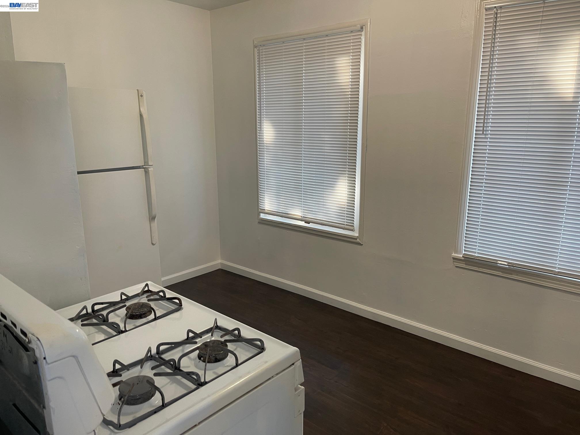 22622 2nd Street Hayward, CA 94541 - Photo 8 of 36 a kitchen with a stove and a refrigerator