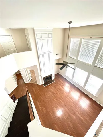 a view of living room with furniture and floor to ceiling window