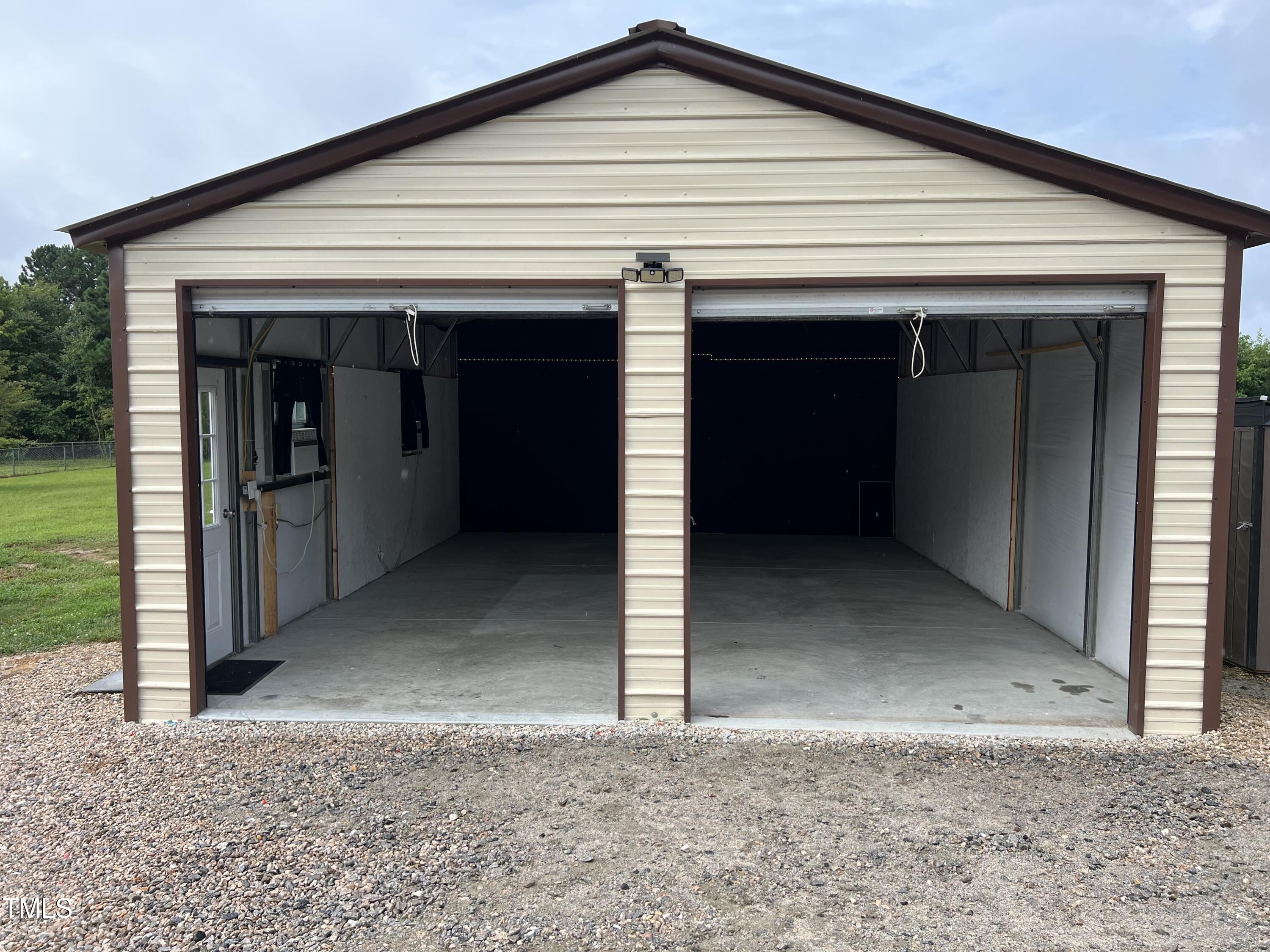 125 Old Halifax Road Louisburg, NC 27549 - Photo 15 of 17 Metal Building with Doors Open