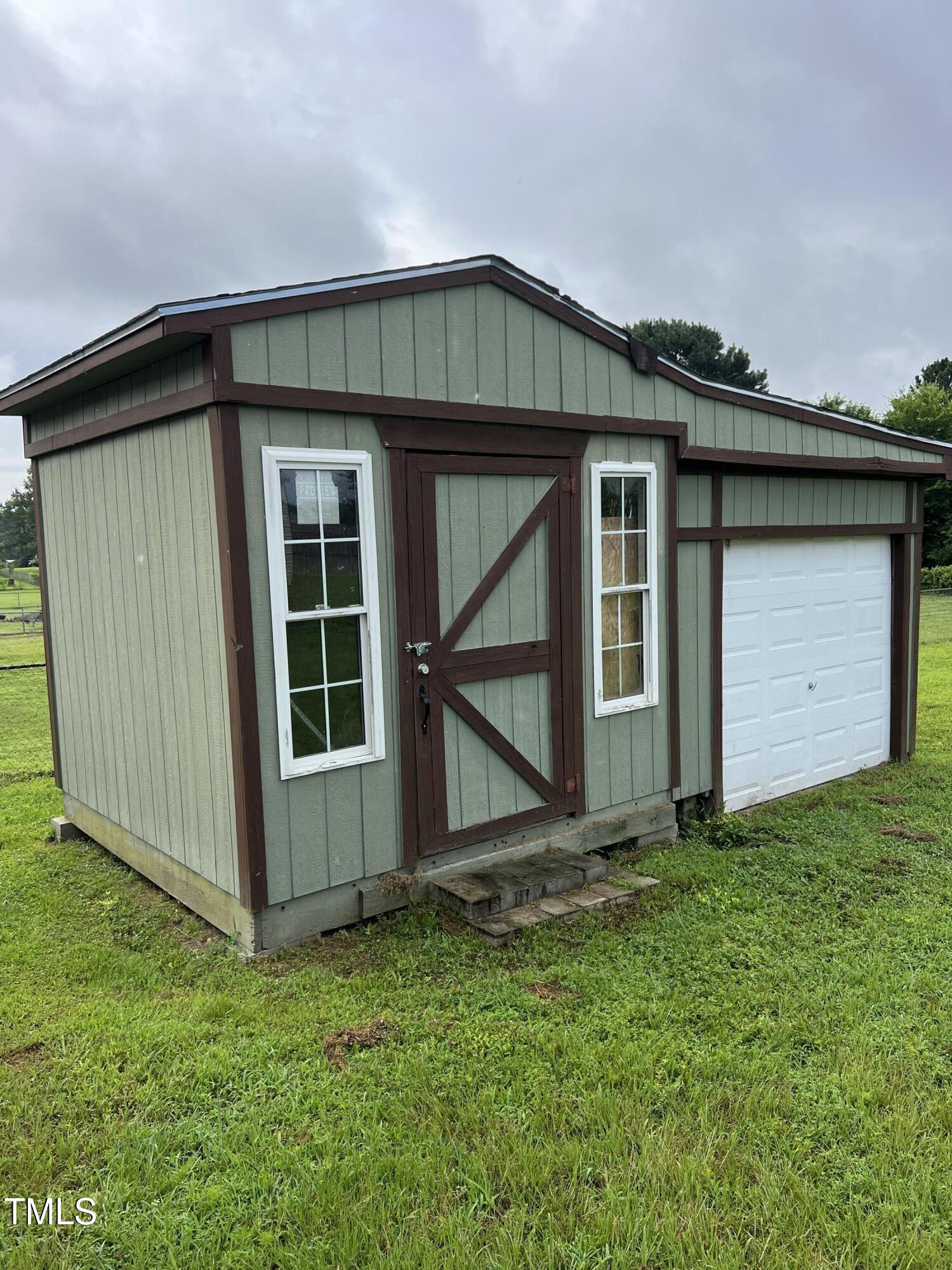 125 Old Halifax Road Louisburg, NC 27549 - Photo 17 of 17 Storage Shed