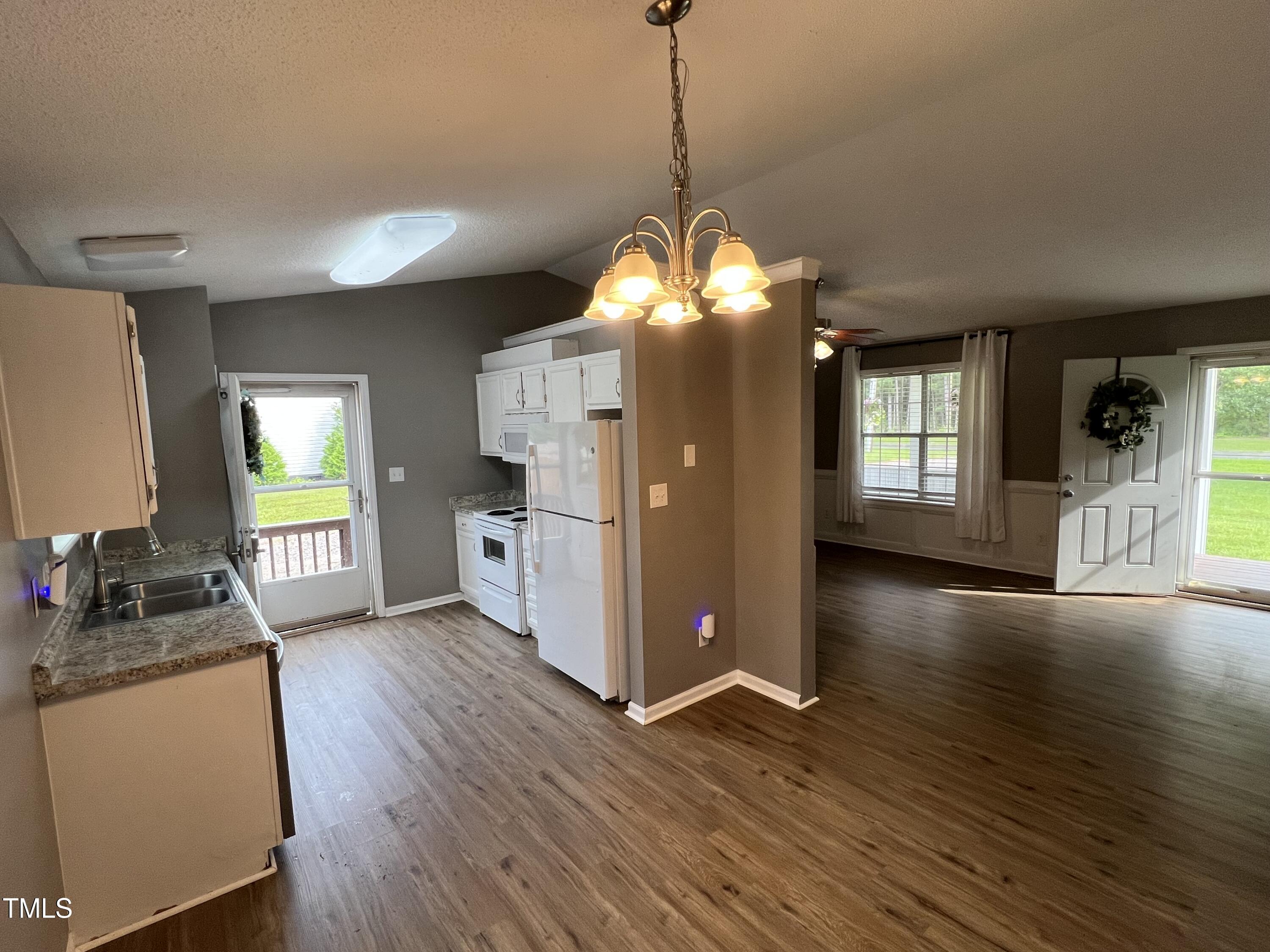 125 Old Halifax Road Louisburg, NC 27549 - Photo 4 of 17 Kitchen/Living Room