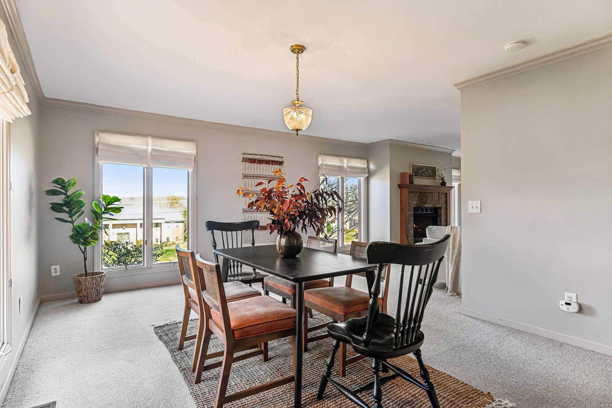 700 3rd Avenue West Springfield, TN 37172 - Photo 12 of 55 a dining room with furniture potted plants and wooden floor