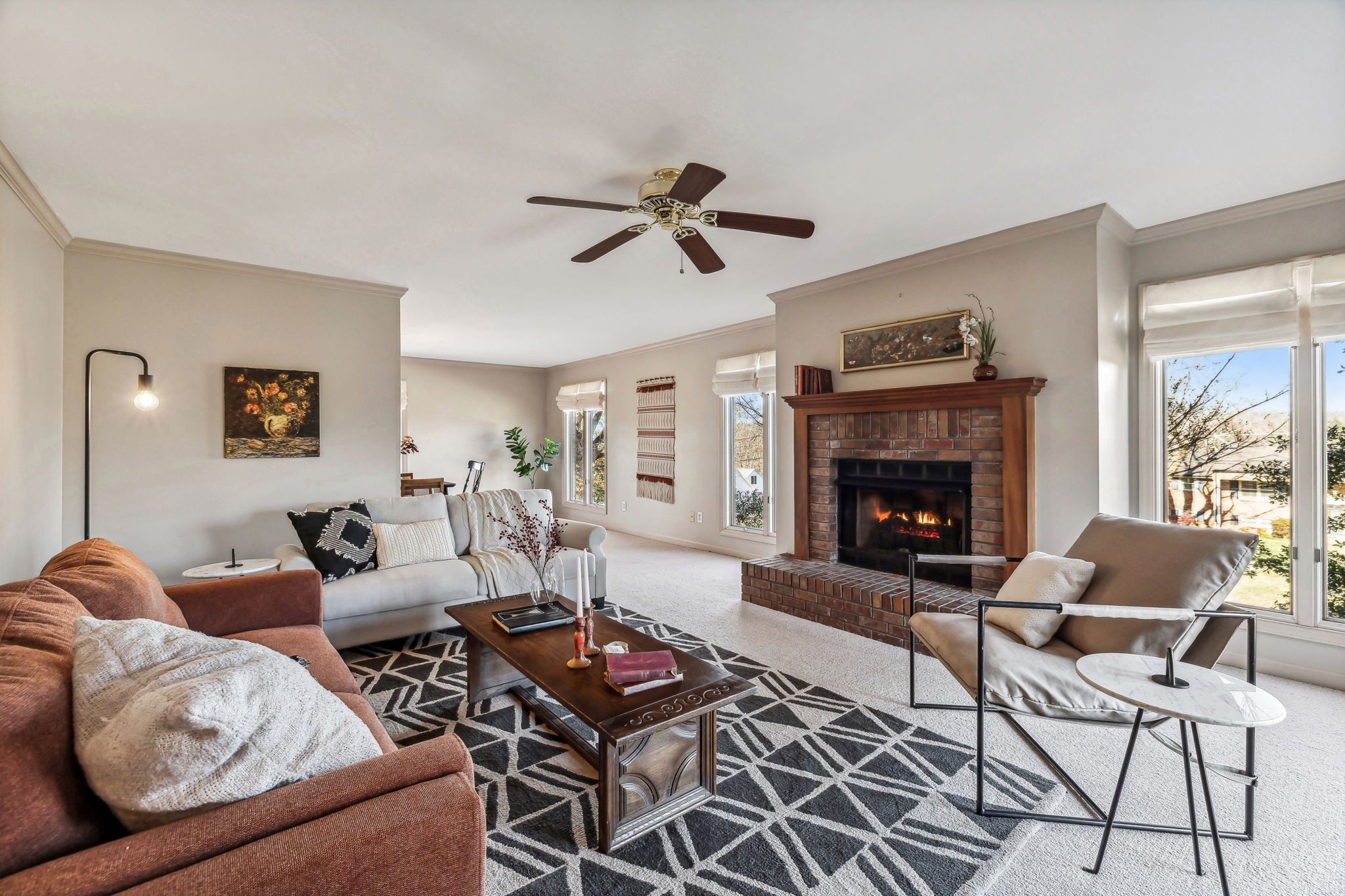 700 3rd Avenue West Springfield, TN 37172 - Photo 2 of 55 a living room with furniture and a fireplace