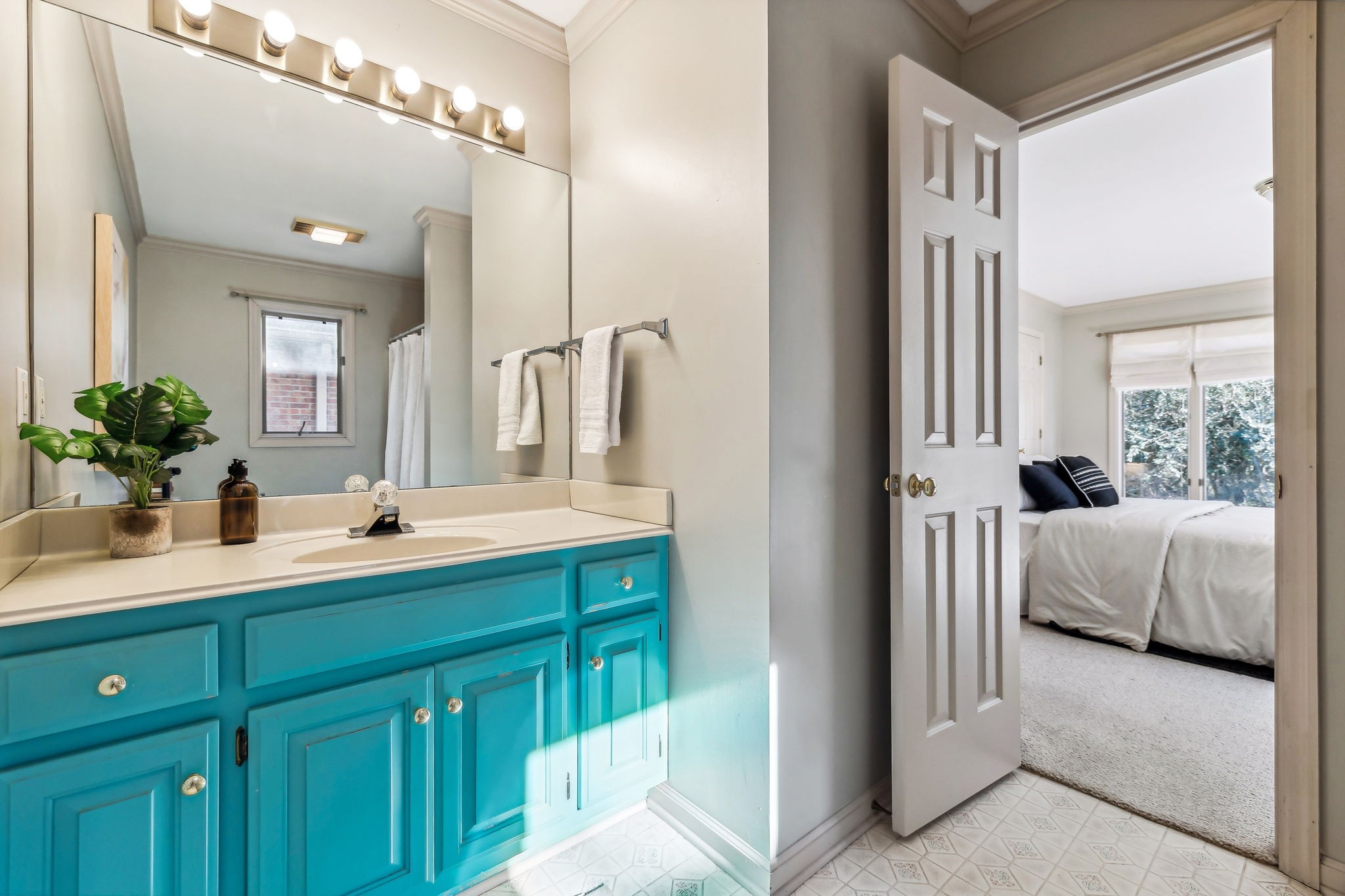 700 3rd Avenue West Springfield, TN 37172 - Photo 27 of 55 a en suite bathroom with a sink double vanity and mirror