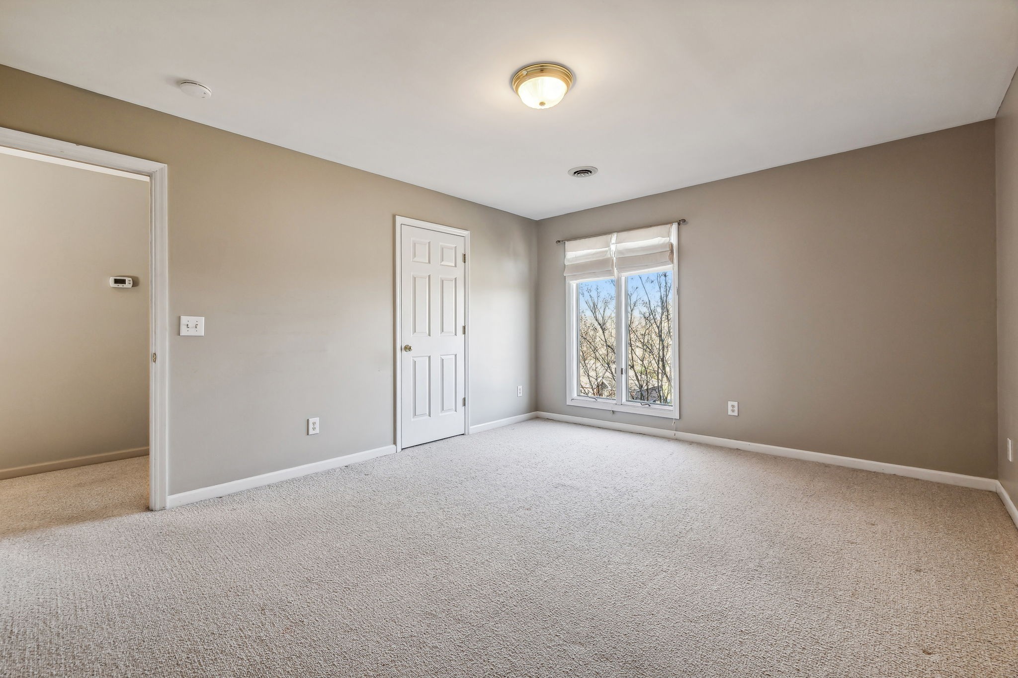 700 3rd Avenue West Springfield, TN 37172 - Photo 32 of 55 a view of an empty room with a window