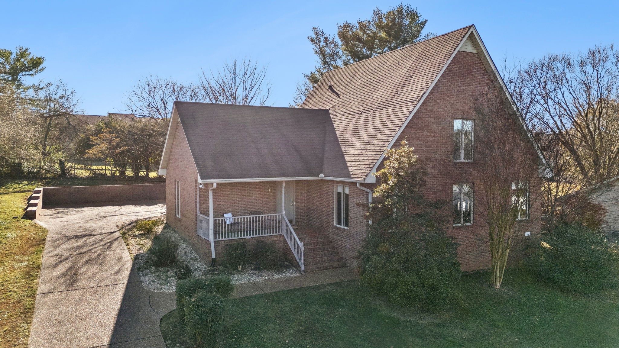 700 3rd Avenue West Springfield, TN 37172 - Photo 40 of 55 a backyard of a house with table and chairs
