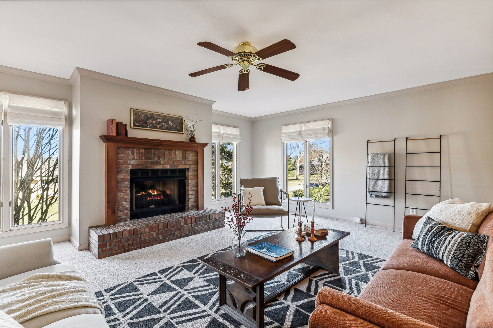 700 3rd Avenue West Springfield, TN 37172 - Photo 5 of 55 a living room with furniture and a fireplace