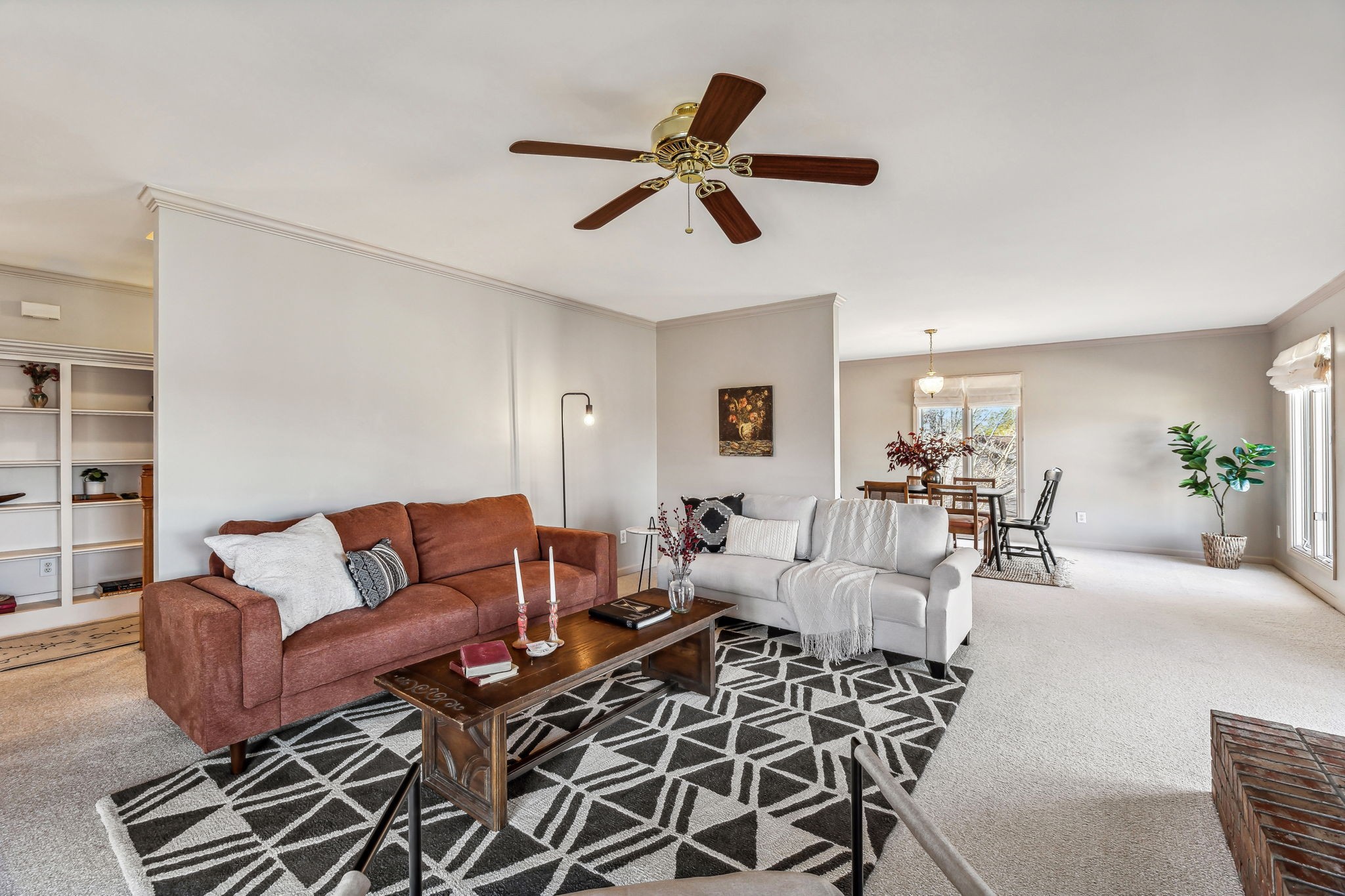 700 3rd Avenue West Springfield, TN 37172 - Photo 8 of 55 a living room with furniture a ceiling fan and a rug
