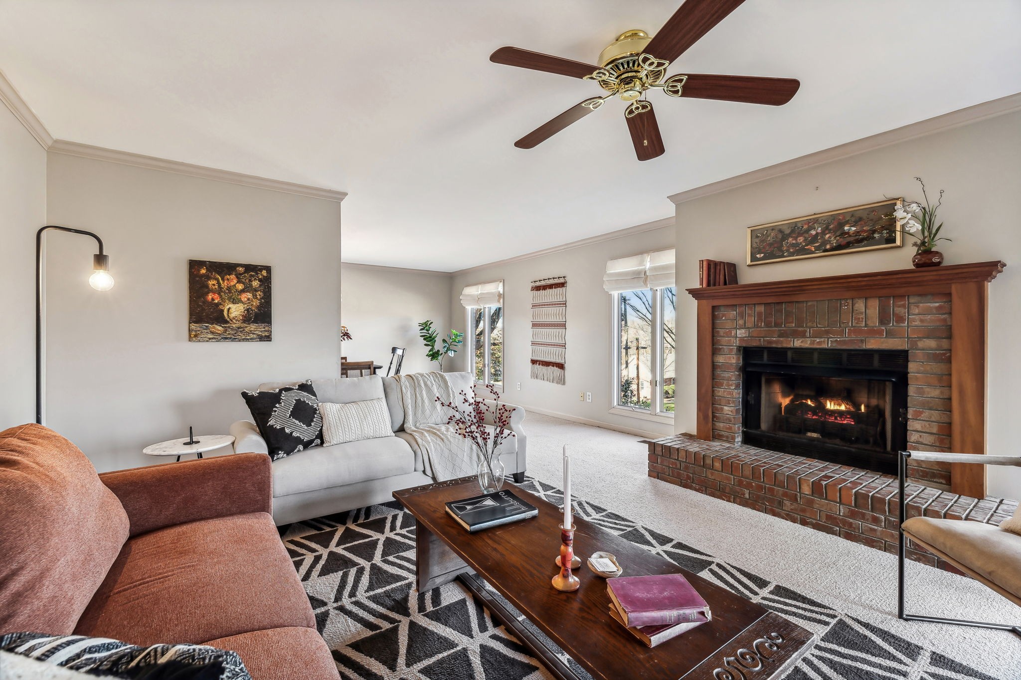700 3rd Avenue West Springfield, TN 37172 - Photo 9 of 55 a living room with furniture and a fireplace