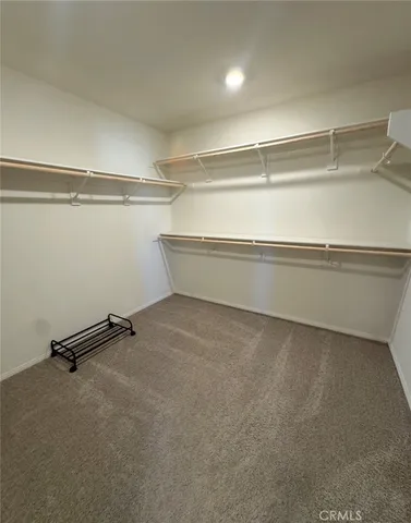 a storage room with washer and dryer