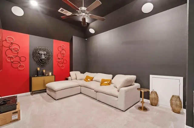 a bedroom with furniture and a chandelier