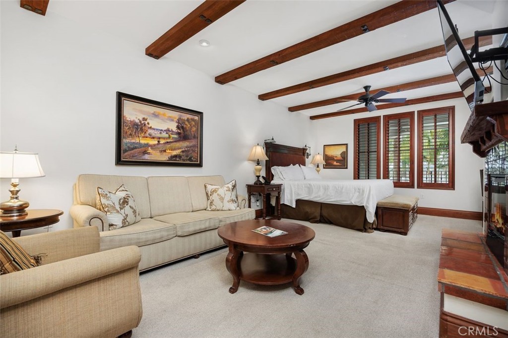 7323 Estrella De Mar Road, Unit 41 Carlsbad, CA 92009 - Photo 12 of 34 a living room with furniture and a large window