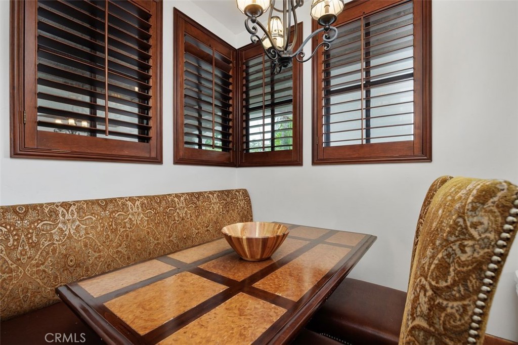 7323 Estrella De Mar Road, Unit 41 Carlsbad, CA 92009 - Photo 19 of 34 a view of a room that has a couch and a chair