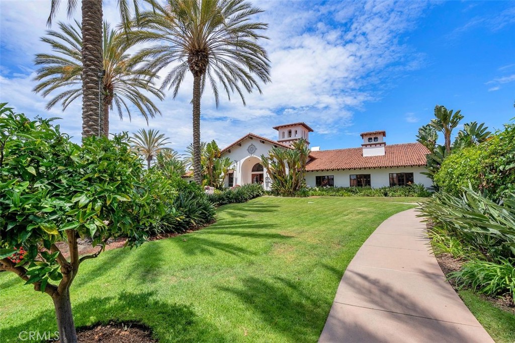 7323 Estrella De Mar Road, Unit 41 Carlsbad, CA 92009 - Photo 28 of 34 a front view of house with yard and green space