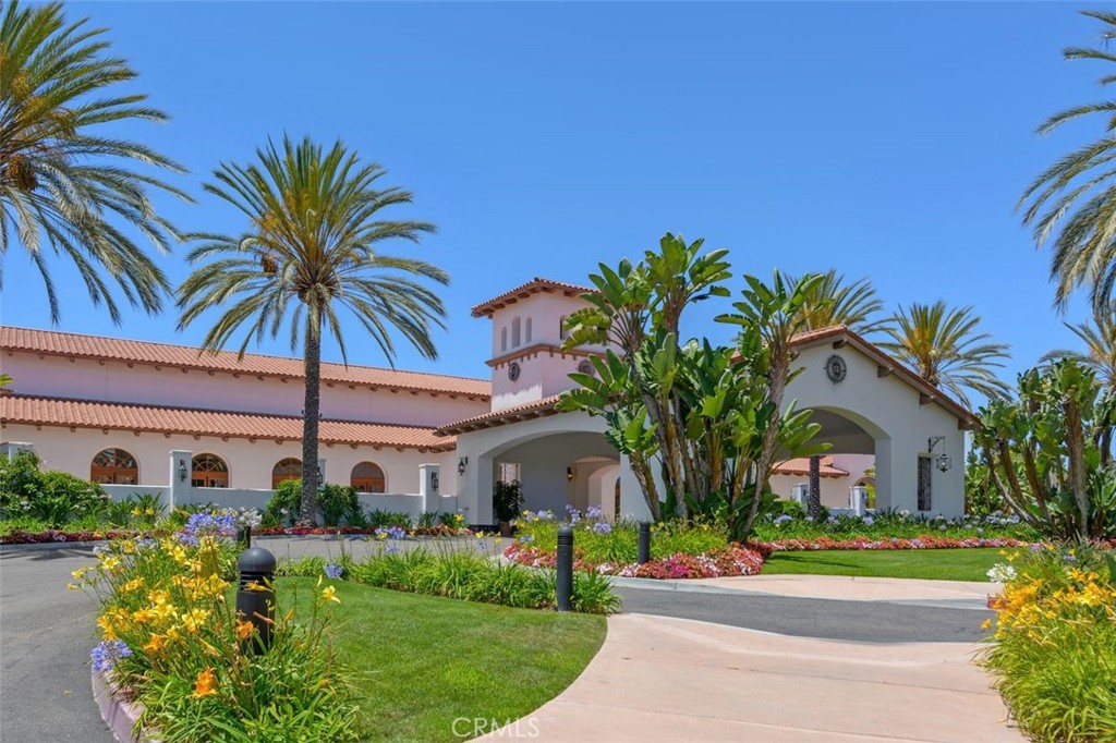 7323 Estrella De Mar Road, Unit 41 Carlsbad, CA 92009 - Photo 31 of 34 a front view of house with yard and green space