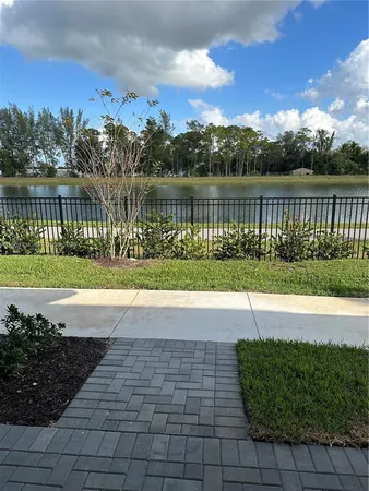 a view of a lake with a garden