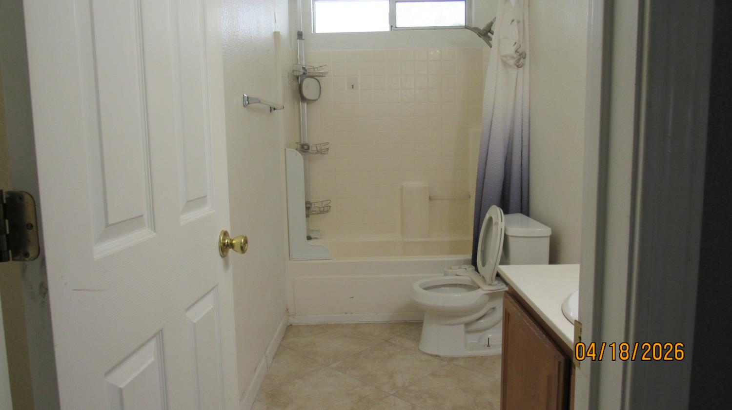 7784 Megan Ann Way Antelope, CA 95843 - Photo 13 of 20 a bathroom with a toilet and shower