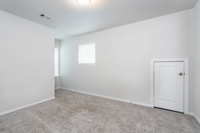 a window and a table in a balcony