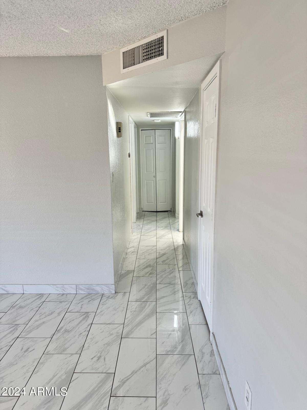 7209 West Luke Avenue Glendale, AZ 85303 - Photo 9 of 19 a view of a hallway