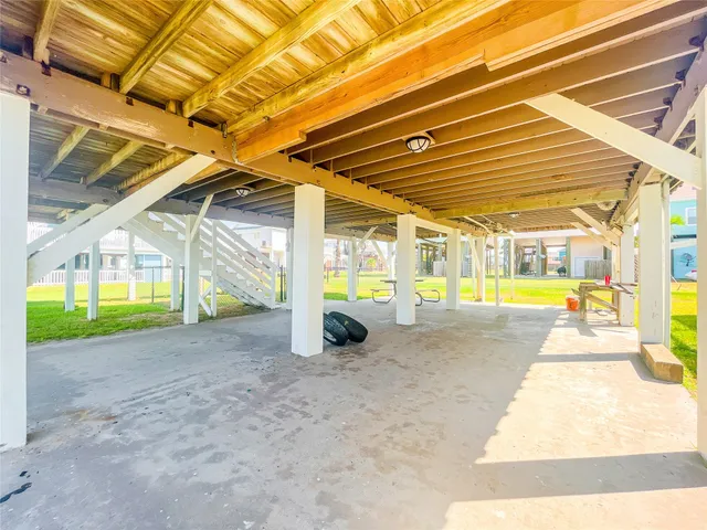 a view of an empty room with a balcony