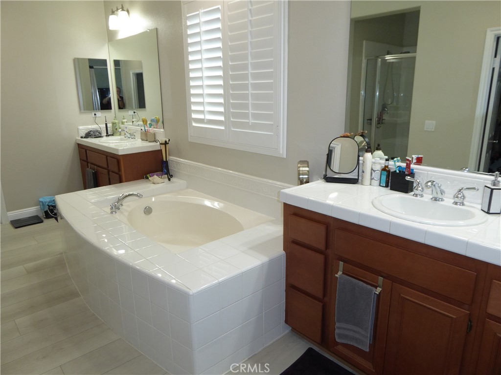 17115 Noble View Circle Riverside, CA 92503 - Photo 31 of 50 Master Bathroom has Double Sinks, a Large Tub also His & Hers Walk-in Closets.