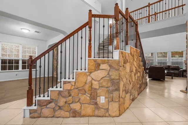a view of an entryway with staircase