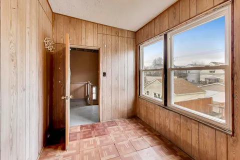 a view of an empty room and window