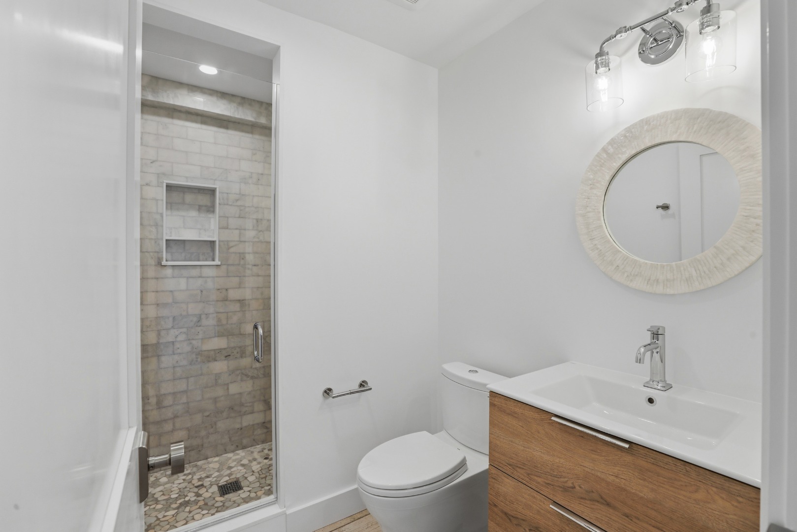10 Rudder Lane Nantucket, MA 02554 - Photo 32 of 33 a bathroom with a sink a toilet and a mirror