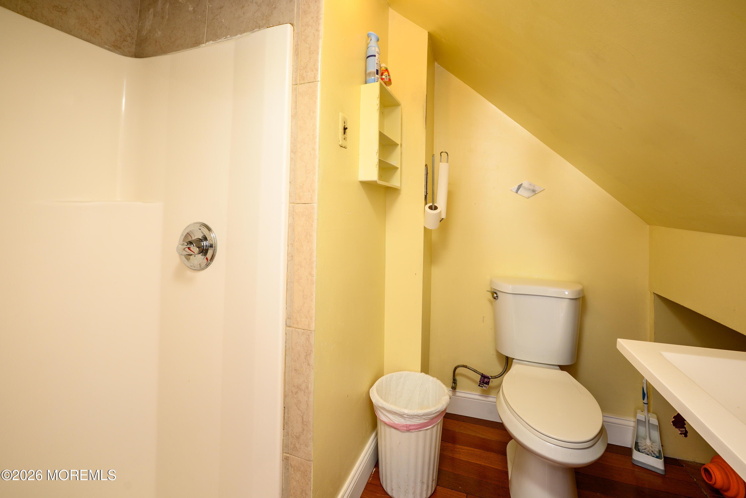 2nd Avenue, Unit 2 Long Branch, NJ 07740 - Photo 23 of 32 a bathroom with a toilet and a shower
