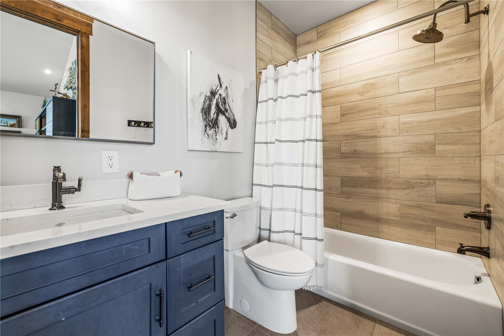230 Game Trail Road Silverthorne, CO 80498 - Photo 25 of 43 a bathroom with a sink a toilet and shower