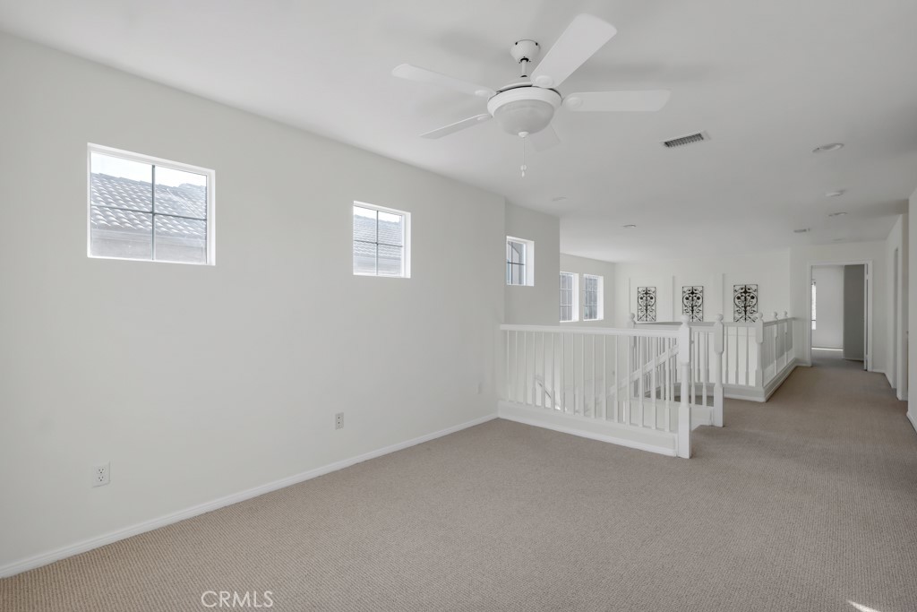 11205 Salerno Porter Ranch Porter Ranch, CA 91326 - Photo 19 of 43 a view of an empty room with white walls